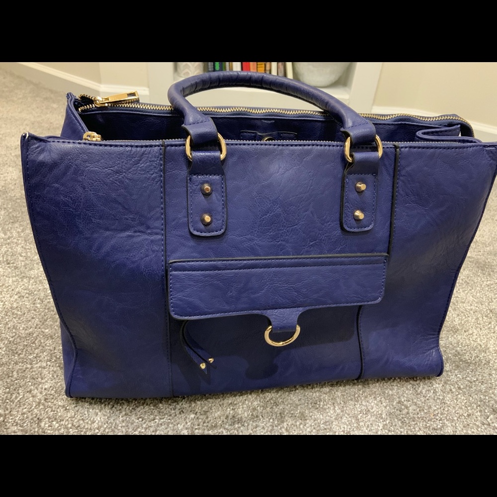 Barely used Nice blue hand bag.